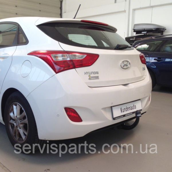 Польський фаркоп на Hyundai I30 hatchback 2012-2018 без підрізання бампера Швидкознімний вертикальний автомат на ключі - Зображення 9